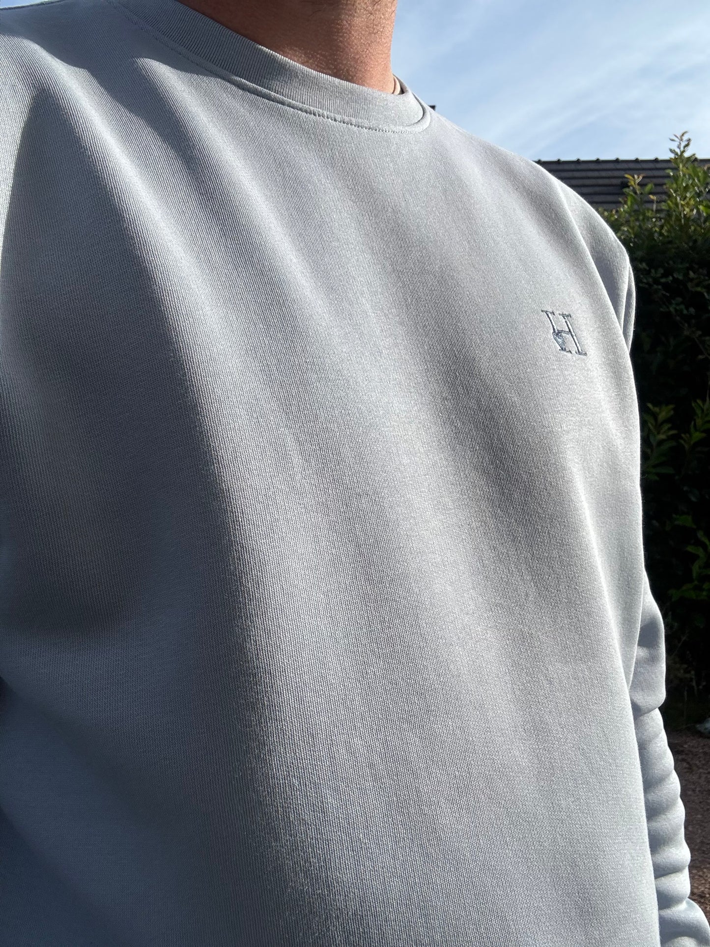 Sweat col rond unisexe bleu pastel.