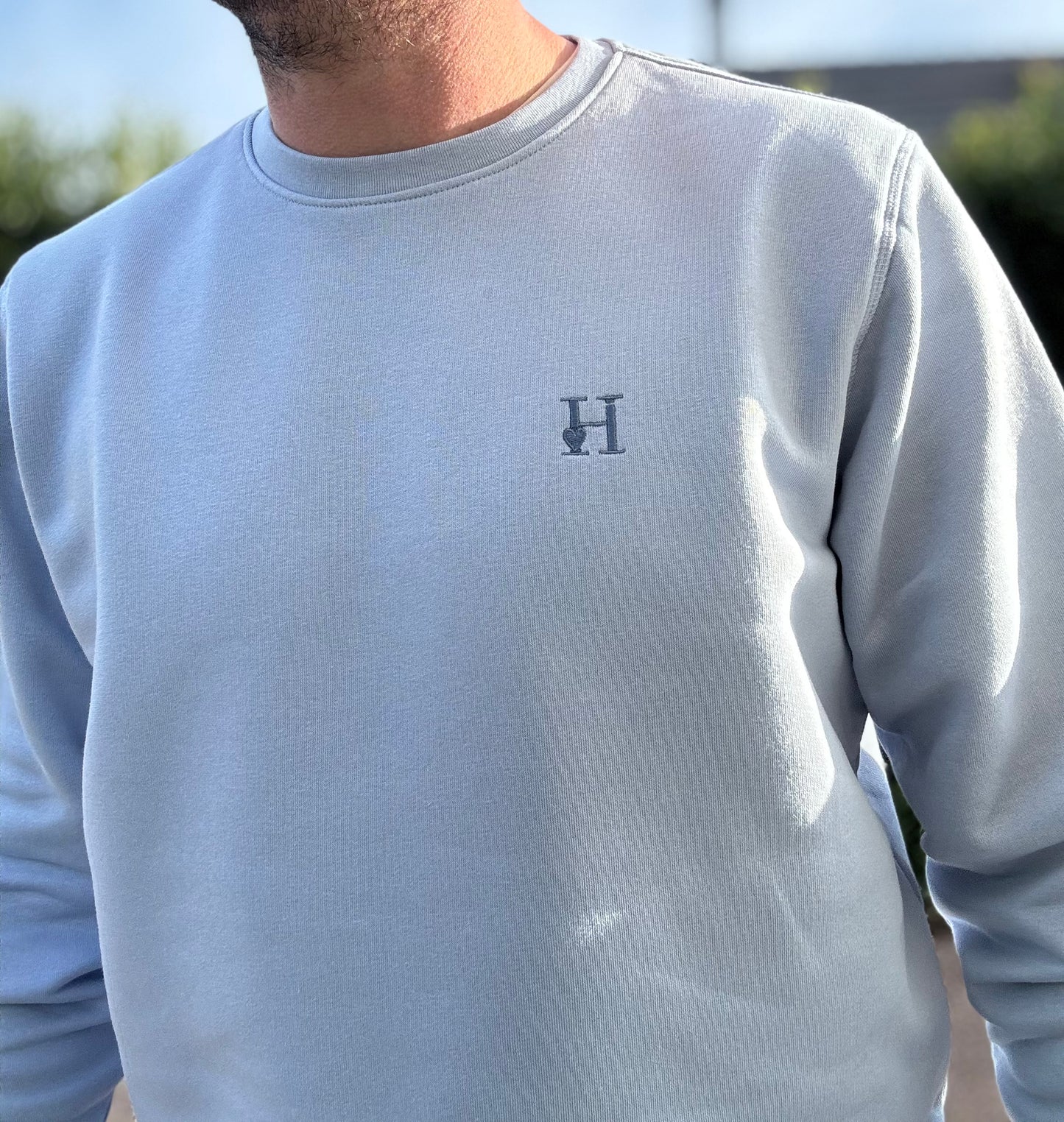 Sweat col rond unisexe bleu pastel.
